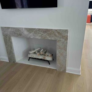 Taj Mahal Quartzite Fireplace Installation in Mount Pleasant, WI